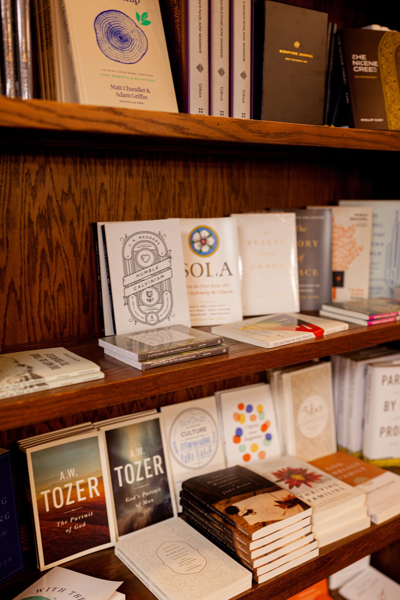 Several books displayed on the bookshelves of the Heritage bookstore.